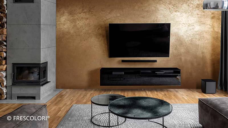 Kreative Wandgestaltung in Gold im Wohnzimmer vom Maler aus Kleve